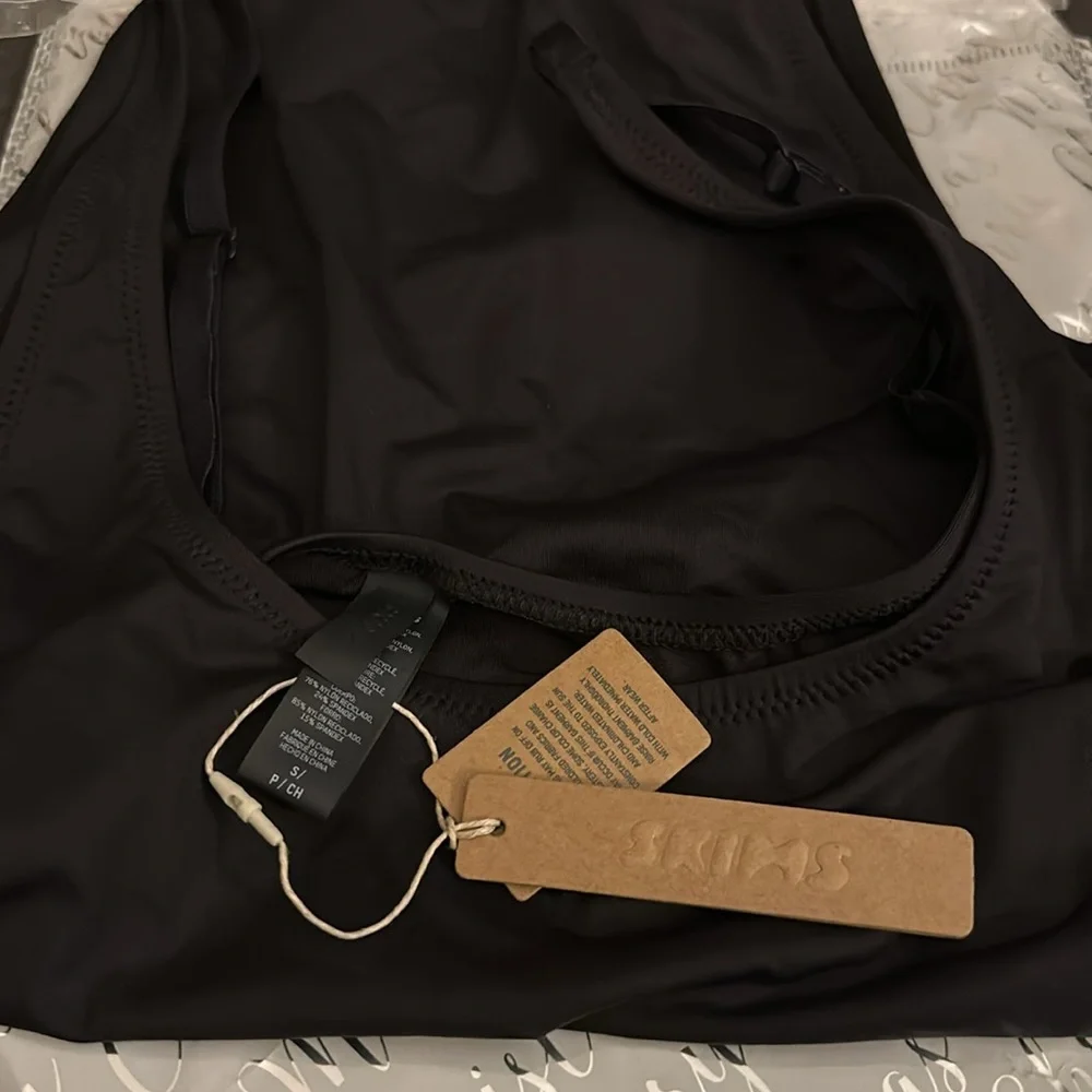 NWT- Skims. Recycled swim. Scoop neck‎ one piece. Onyx/Black.